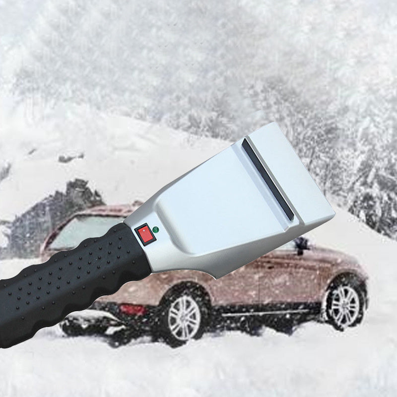 Heatable snow removal shovel